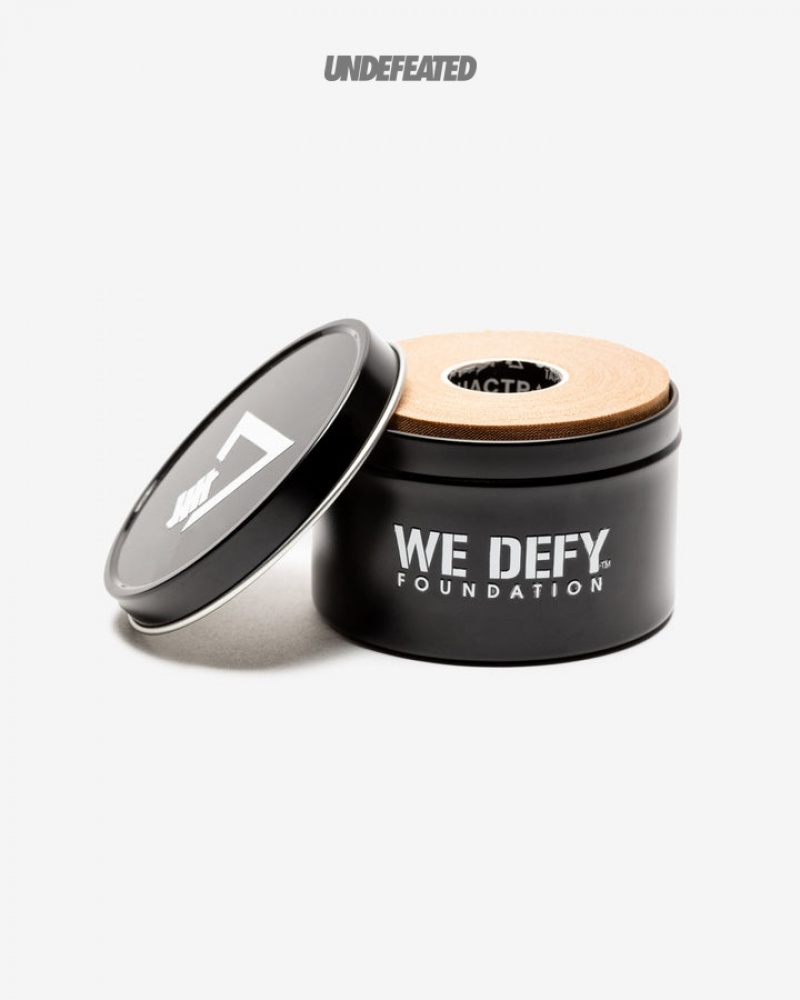 Undefeated Undftd UACTP X MONKEY TAPE X WE DEFY ATHLETIC TAPE, 4-PACK TIN Other Schwarz | UOHBV-4310